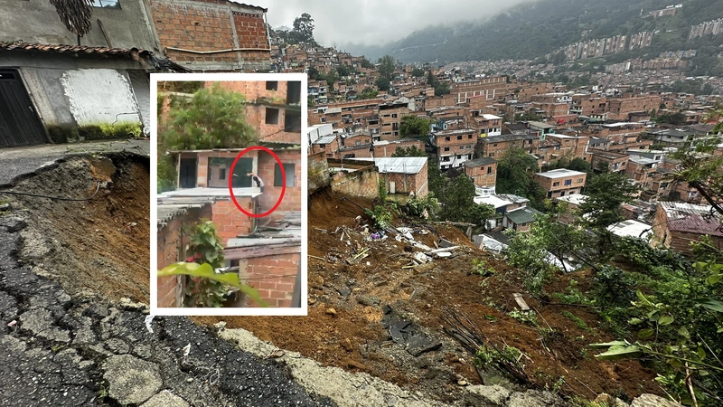 En video quedó grabada una mujer que intenta ingresar a su casa tras ser evacuada por derrumbe en Villatina. Foto: Cortesía