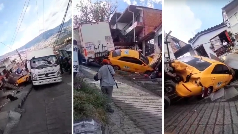 Un camión de Bavaria rodo por una empinada loma en Robledo Aures. Chocó un taxi que terminó contra una vivienda. Foto y video: Denuncias Antioquia