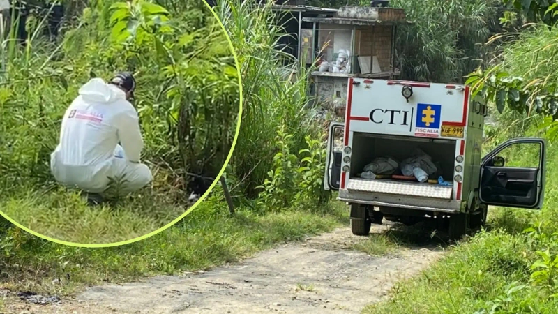 Los cuerpos de los hermanos fueron dejados a la orilla de una quebrada del corregimiento Altavista. Fotos: Mateeo Laverde / TANoticias