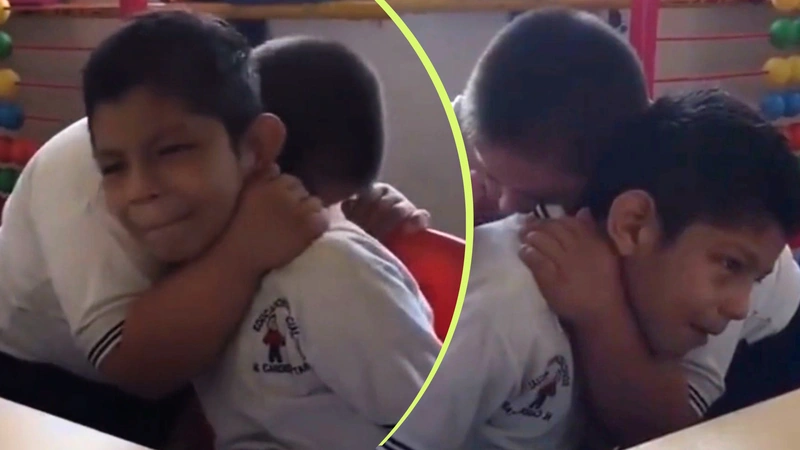 Un abrazo espontáneo entre dos niños se volvió viral en redes por su mensaje de empatía, calma e inclusión. Fotos: captura de pantalla video oficial