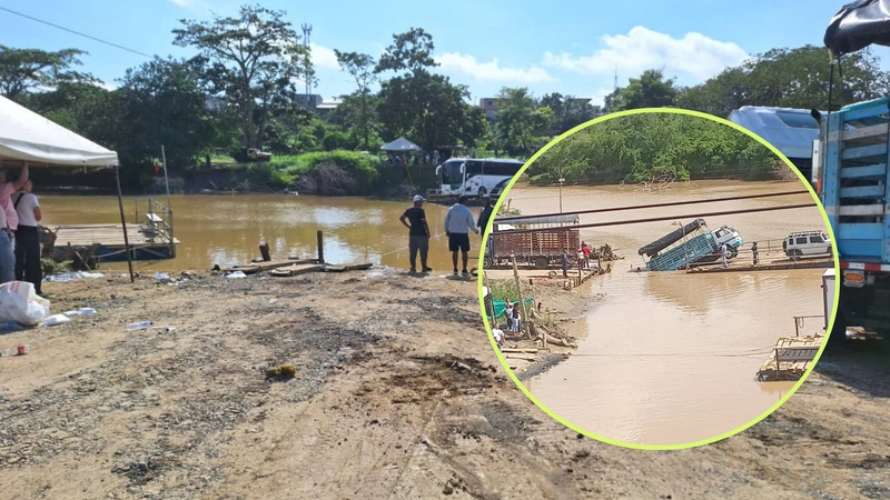Camión cayó al río San Juan en San Juan de Urabá y aumenta la preocupación por retrasos en el puente provisional. Fotos: cortesía